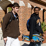 Photo of two FSU students walking around campus