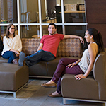 Photo of students lounging on campus
