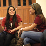 Photo of FSU students sitting in Residence Hall lounge